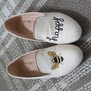 Bee Happy loafers.